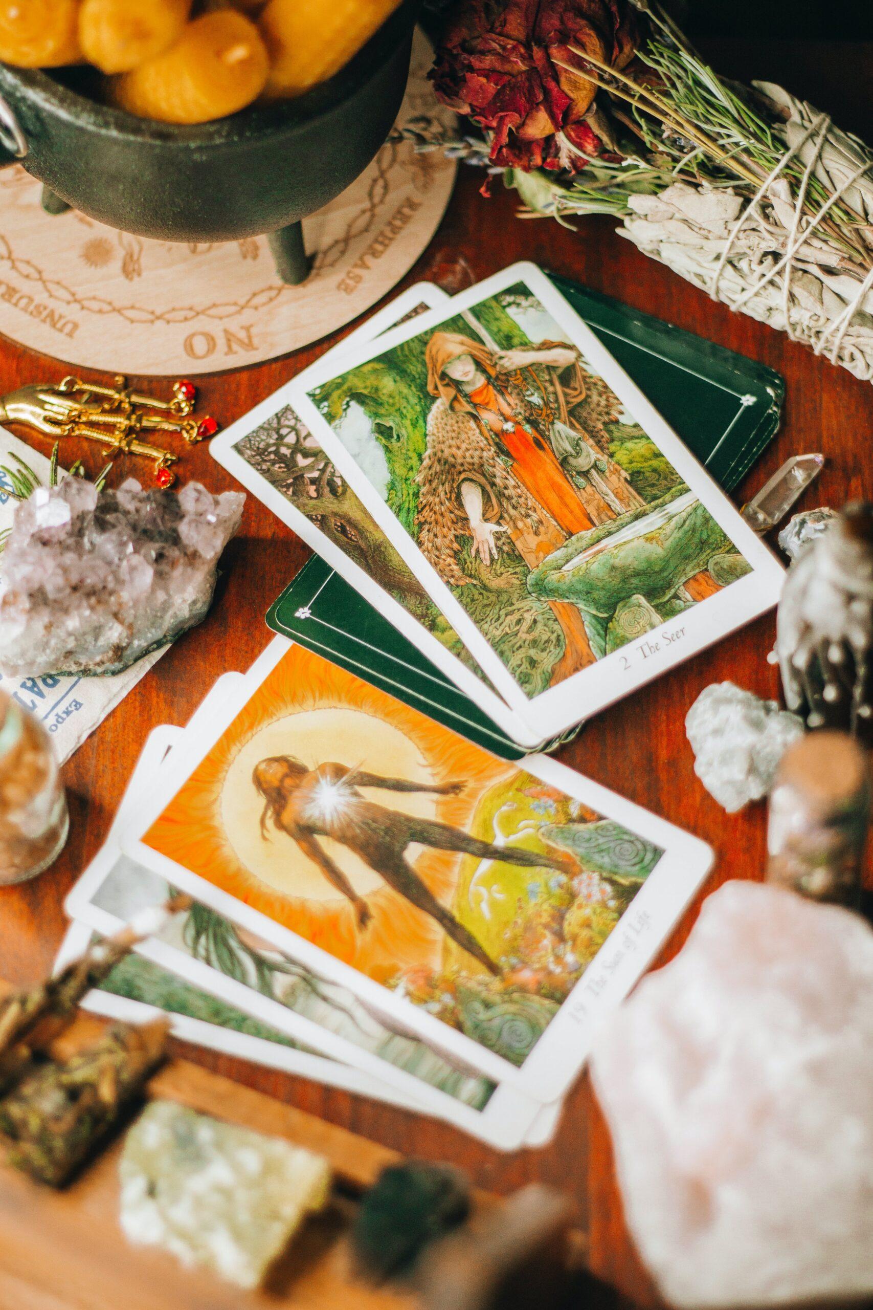 Tarotpolitan psychic Tarot readings. Tarot cards spread in autumn colour palette.